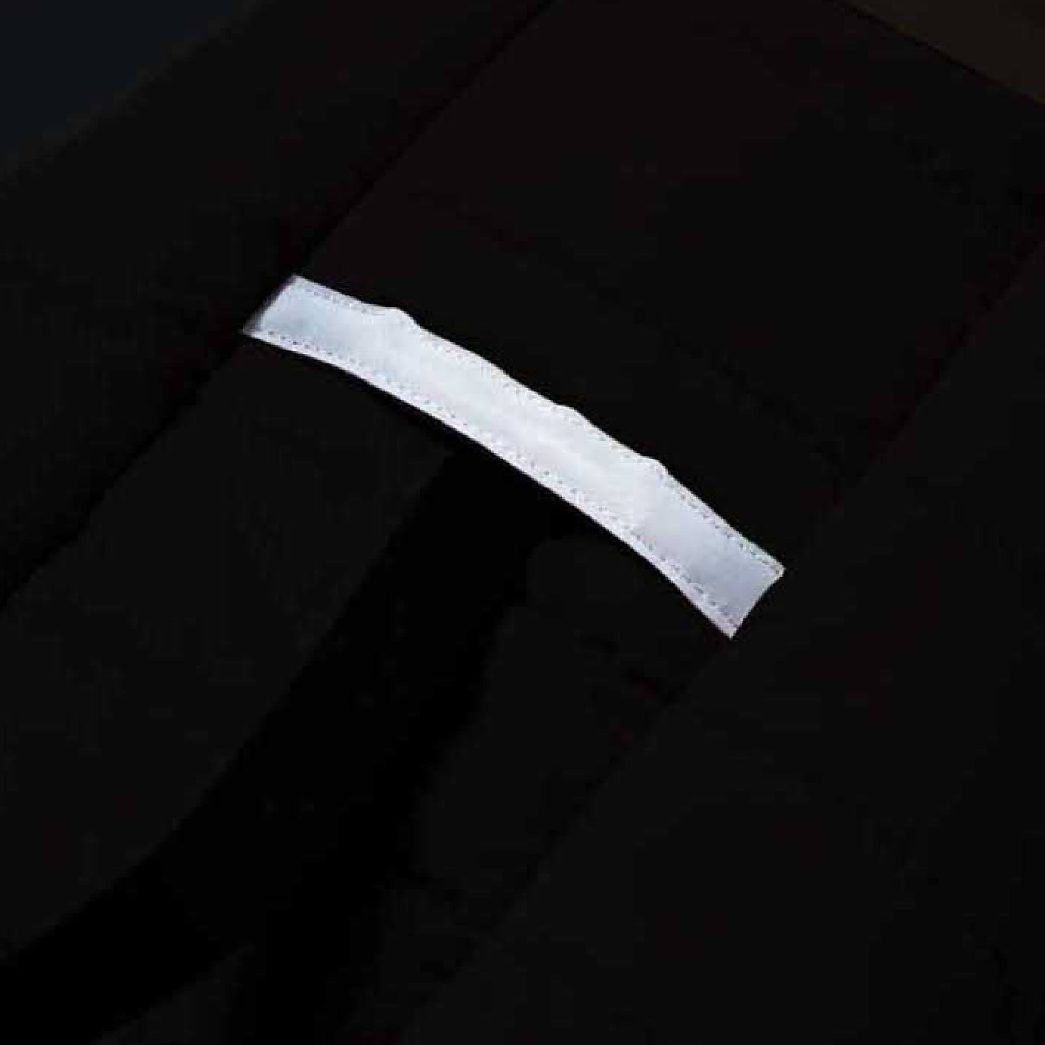Reflective stripe for visibility in low light conditions.