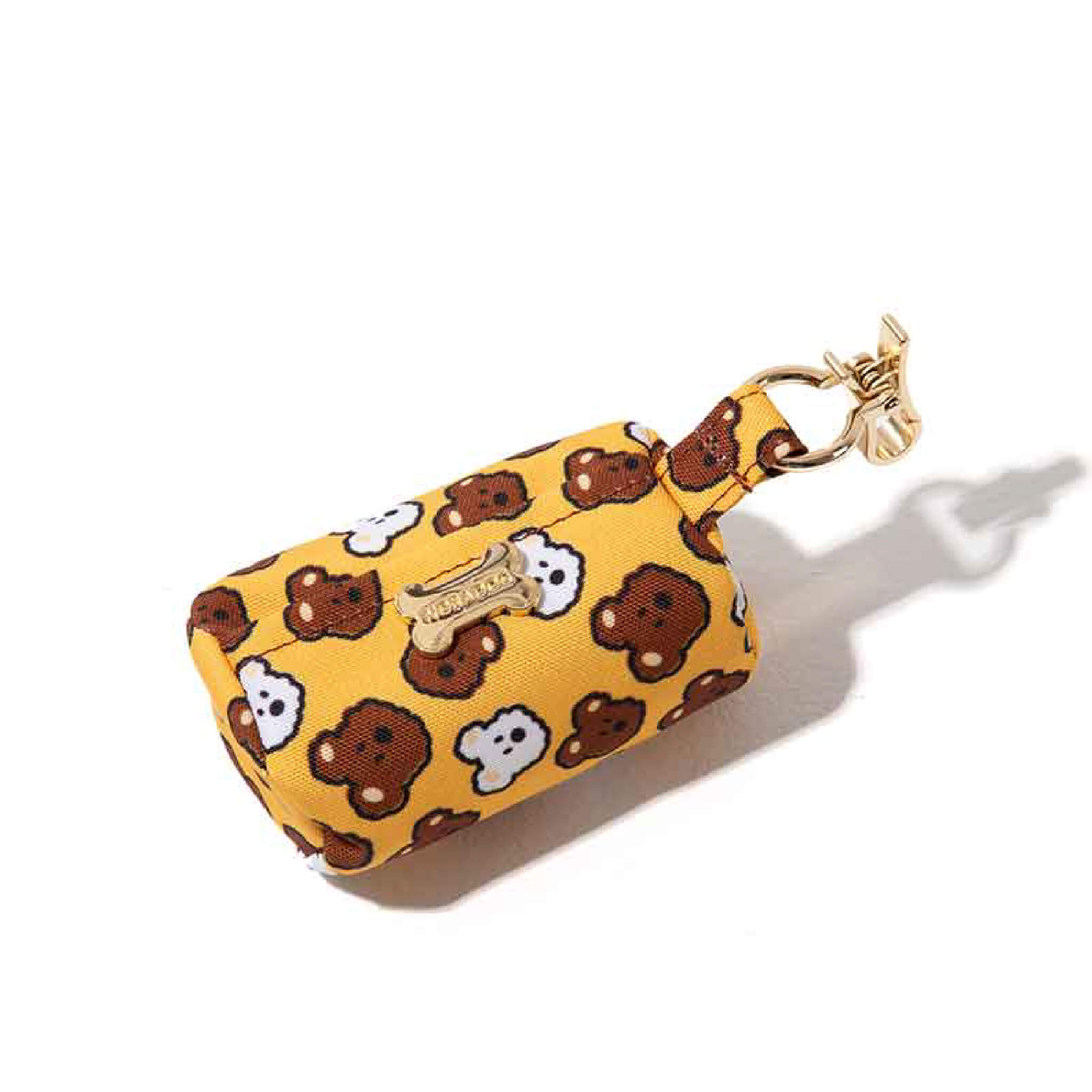 Poop bag holder with a dog pattern.