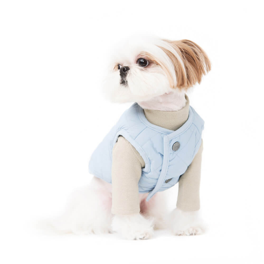 Padded vest with diamond quilting. Model is wearing a SM & weighs 6 pounds (2.8 kg). 
