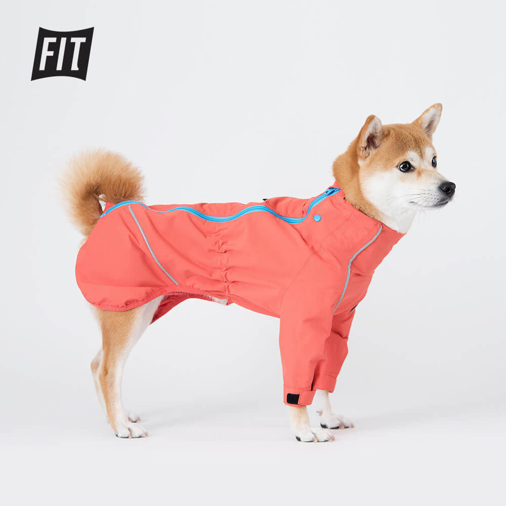 All weather protection jacket in coral. Model is wearing a 2 & weighs 15 pounds (6.8 kg).