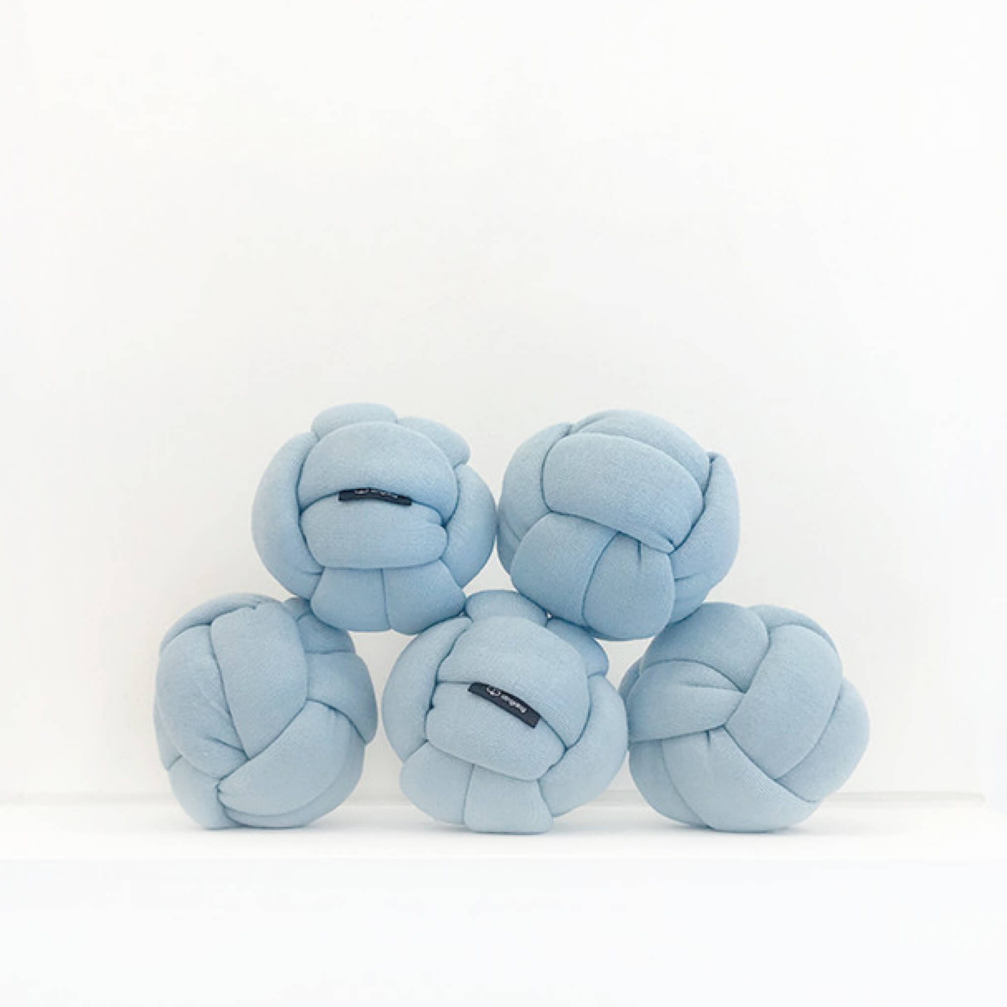 Many blue knotted ball toys.