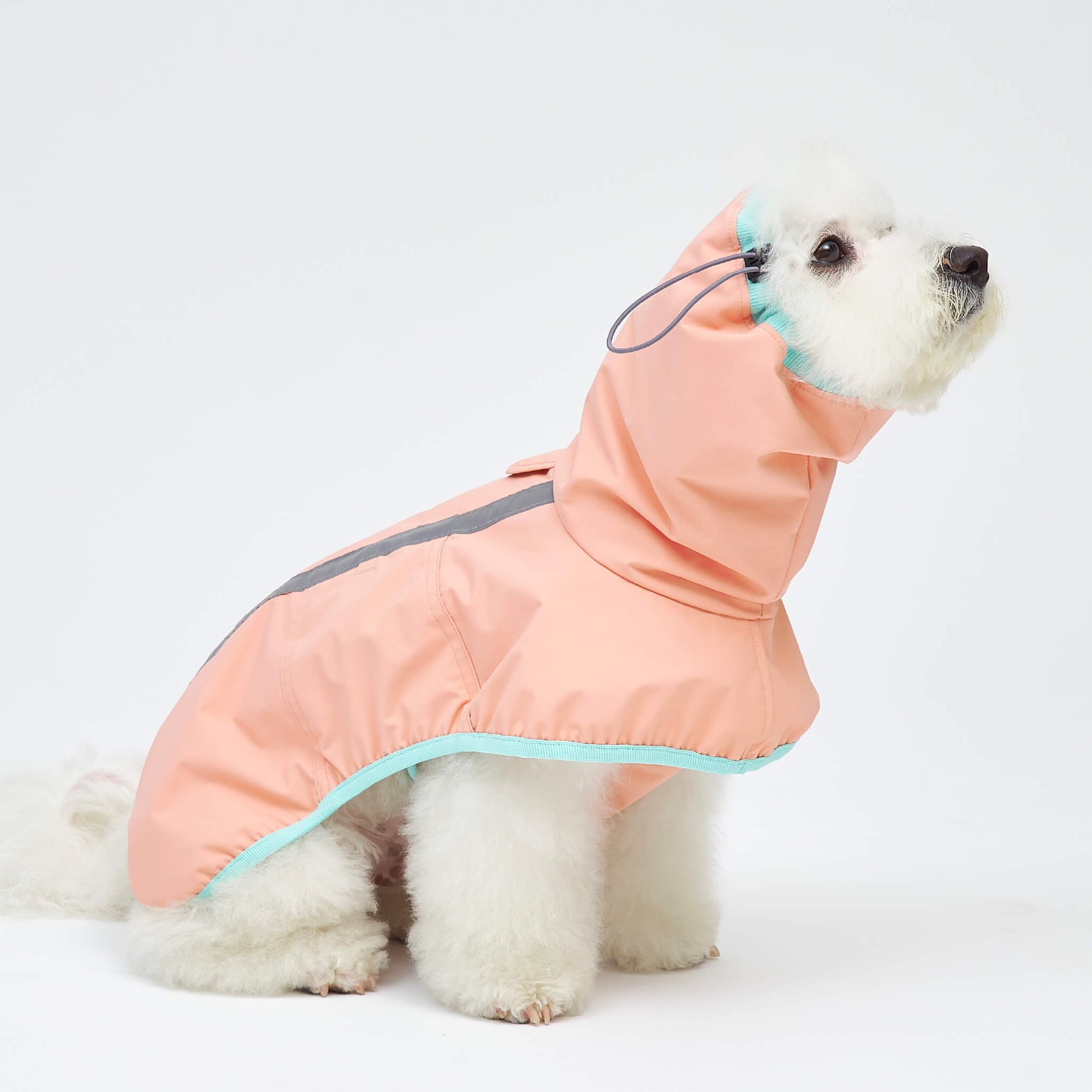 Rain coat in strawberry. Model is wearing a L.