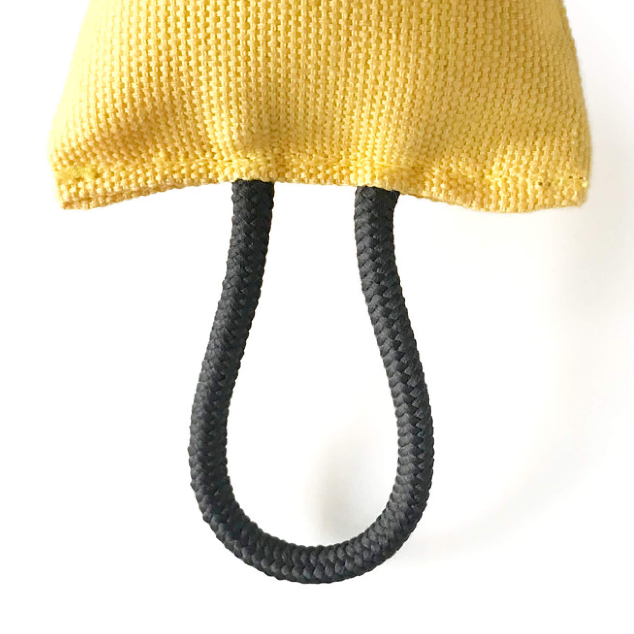 Rope attachment on one end of soda palette toy.