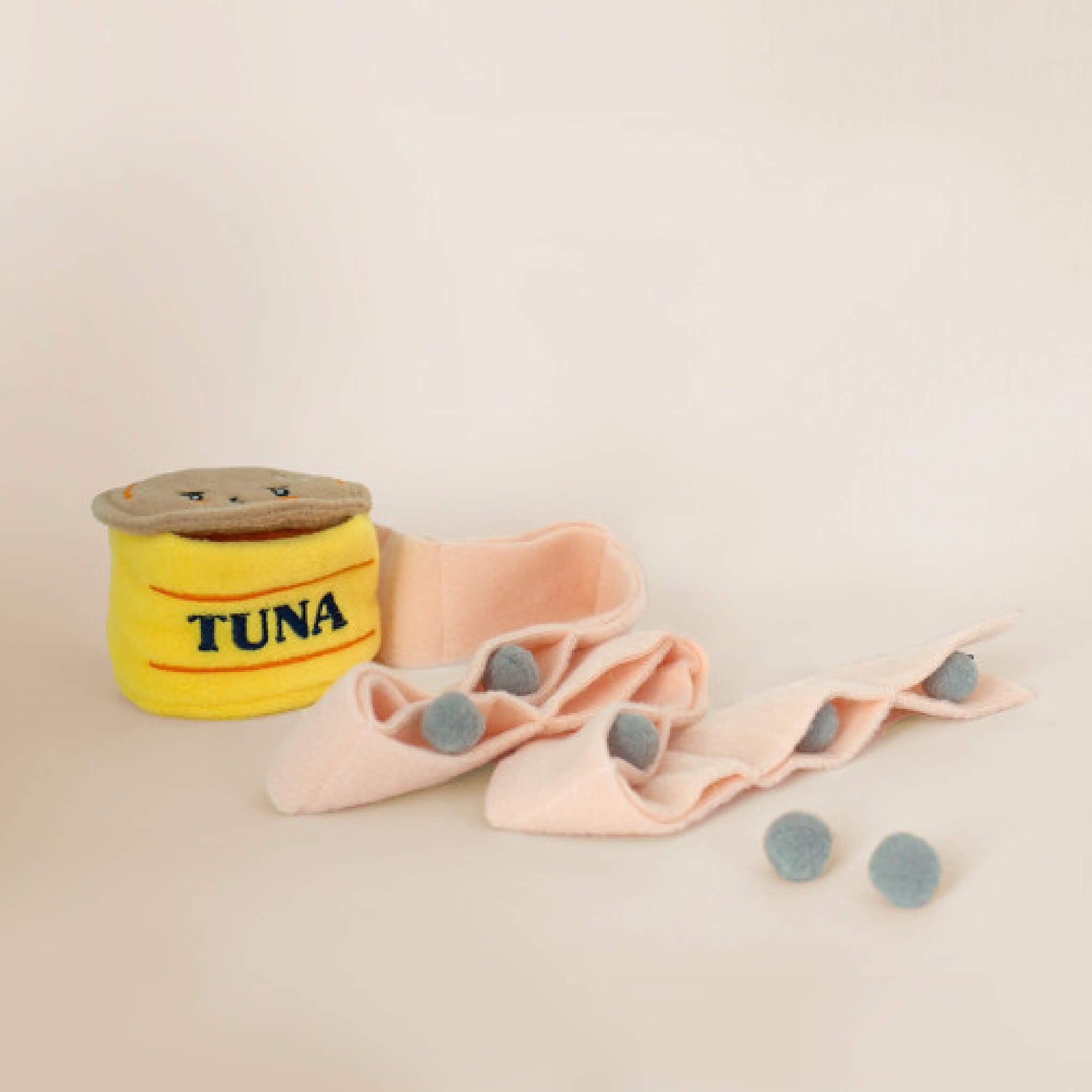 Tuna nosework toy with removable nosework insert.