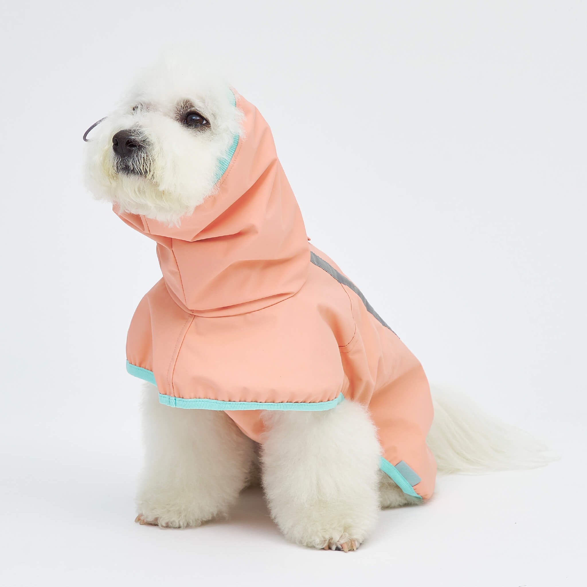 Rain coat in strawberry. Model is wearing a L.