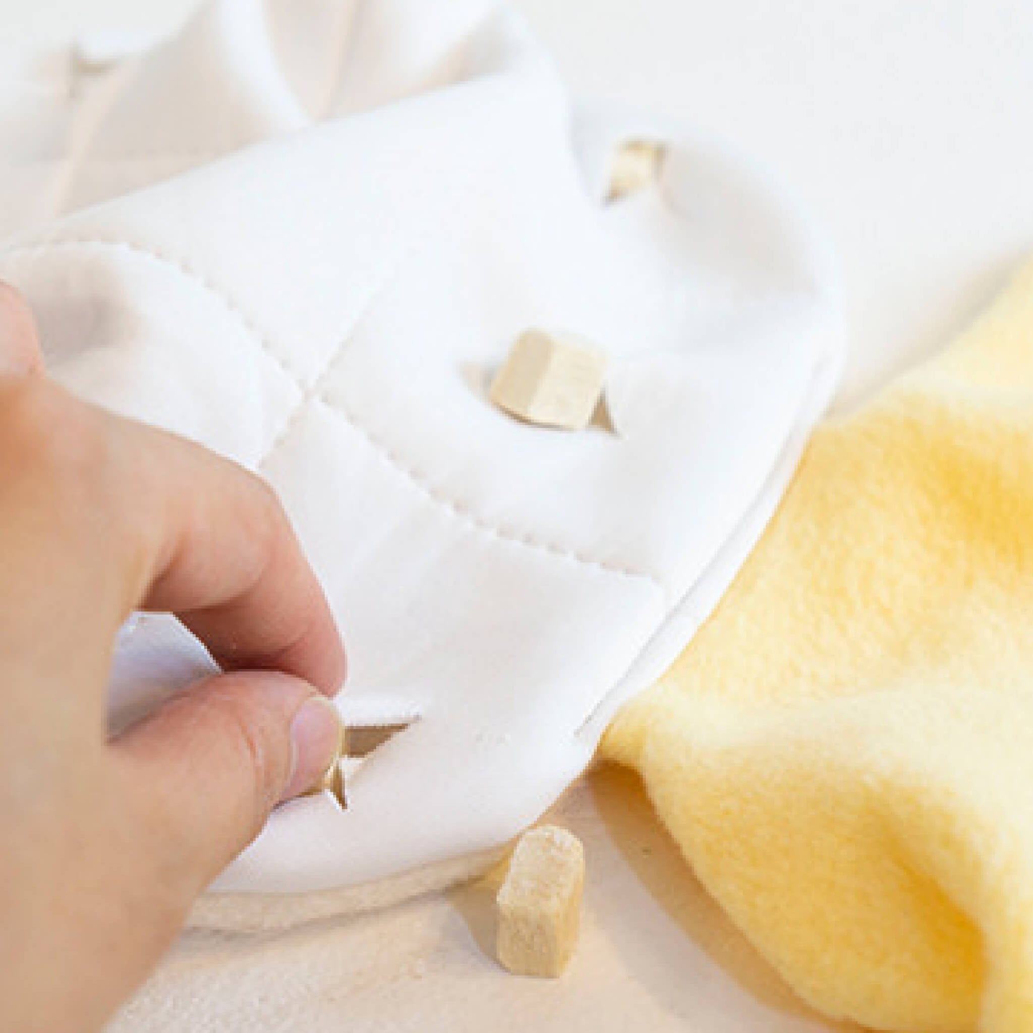 Banana nosework toy with many holes and pockets for snacks and treats.