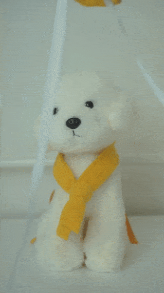 Gif of chef scarf & hat set being worn.