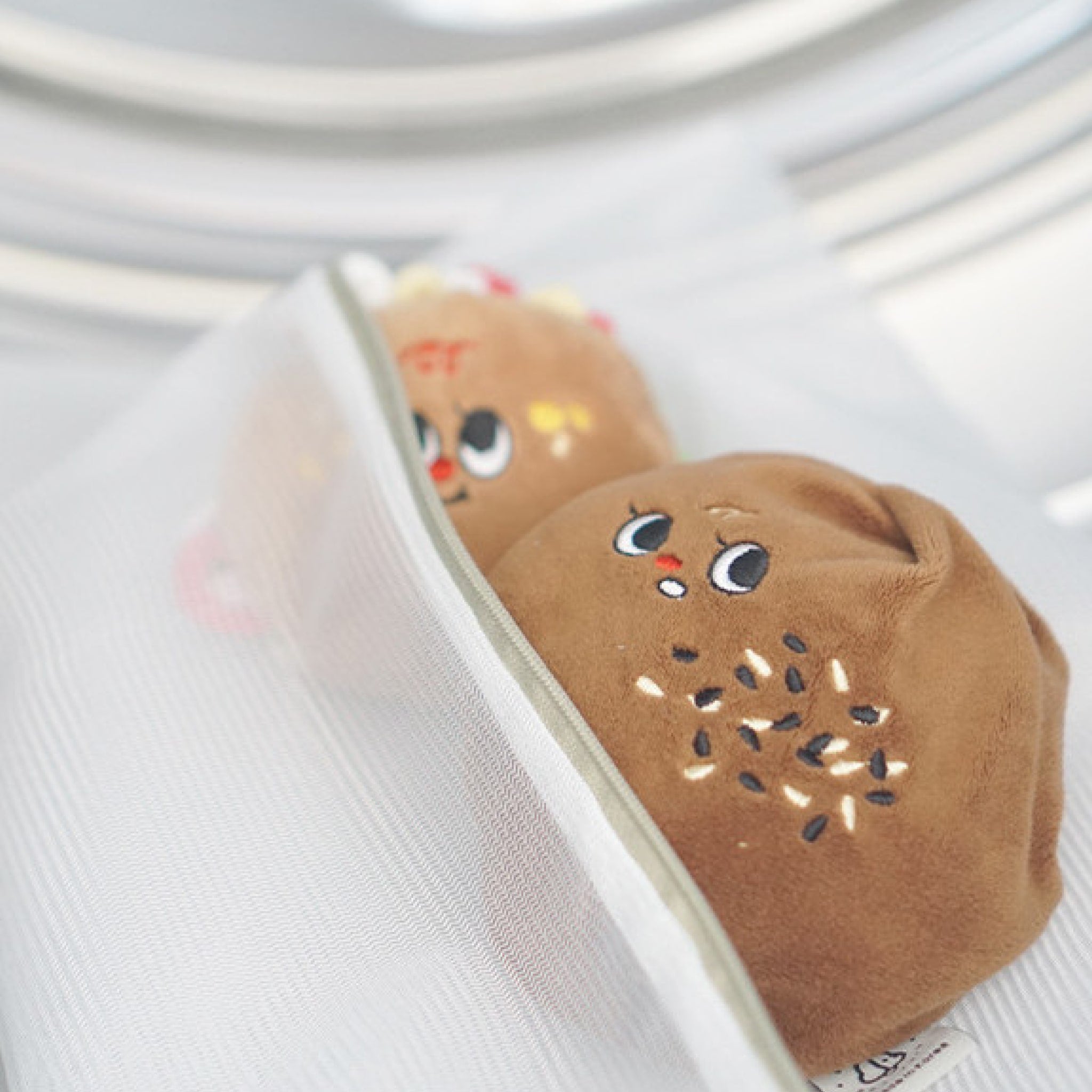 place the toy in a washer bag for machine washing